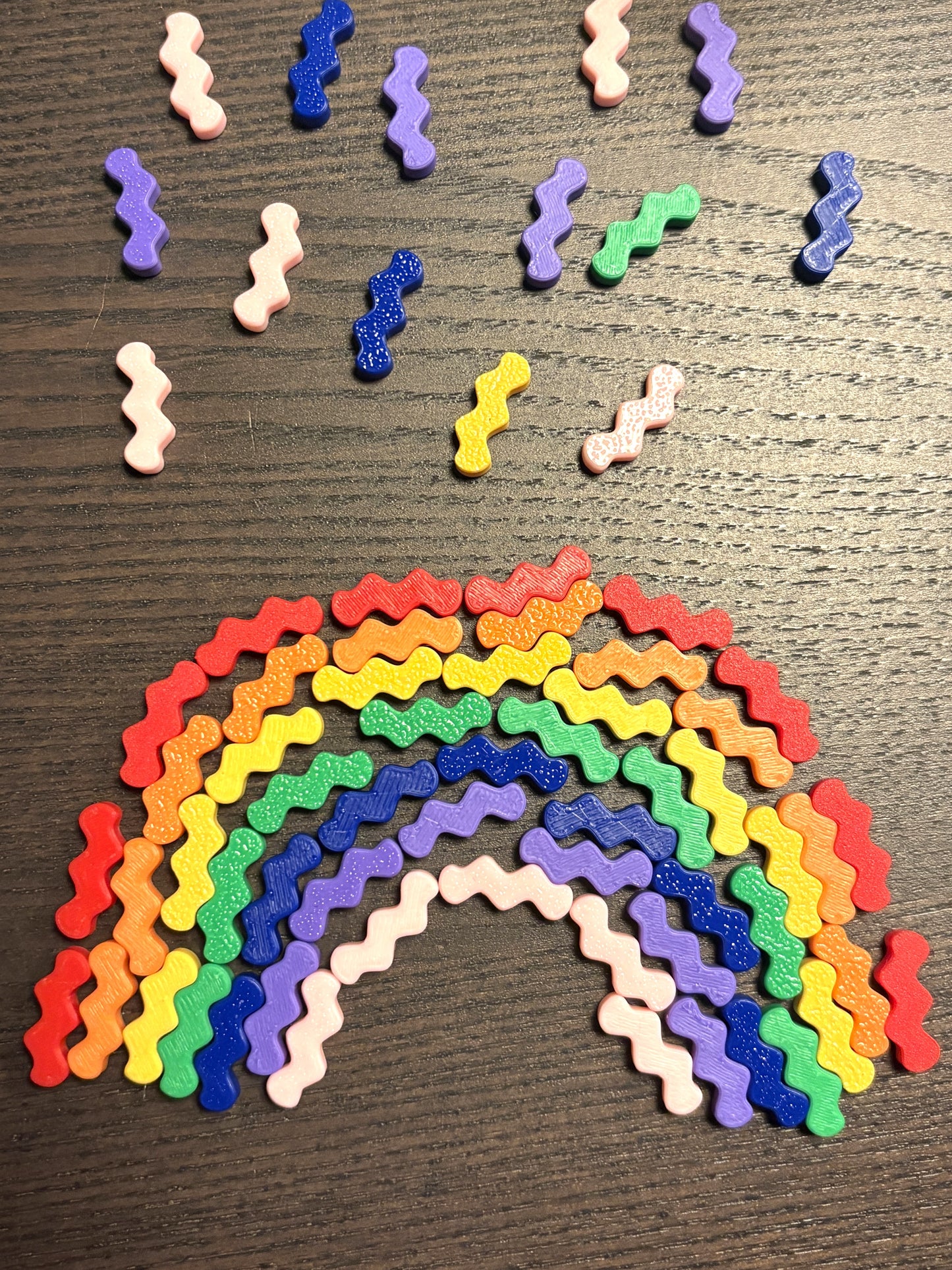Regenboog golfjes confetti